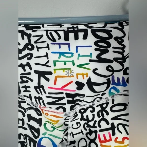 NWOT ATHLETA ELATION TRAIN 7/8
Tight Leggings PRIDE Graffiti words L - Picture 7 of 13